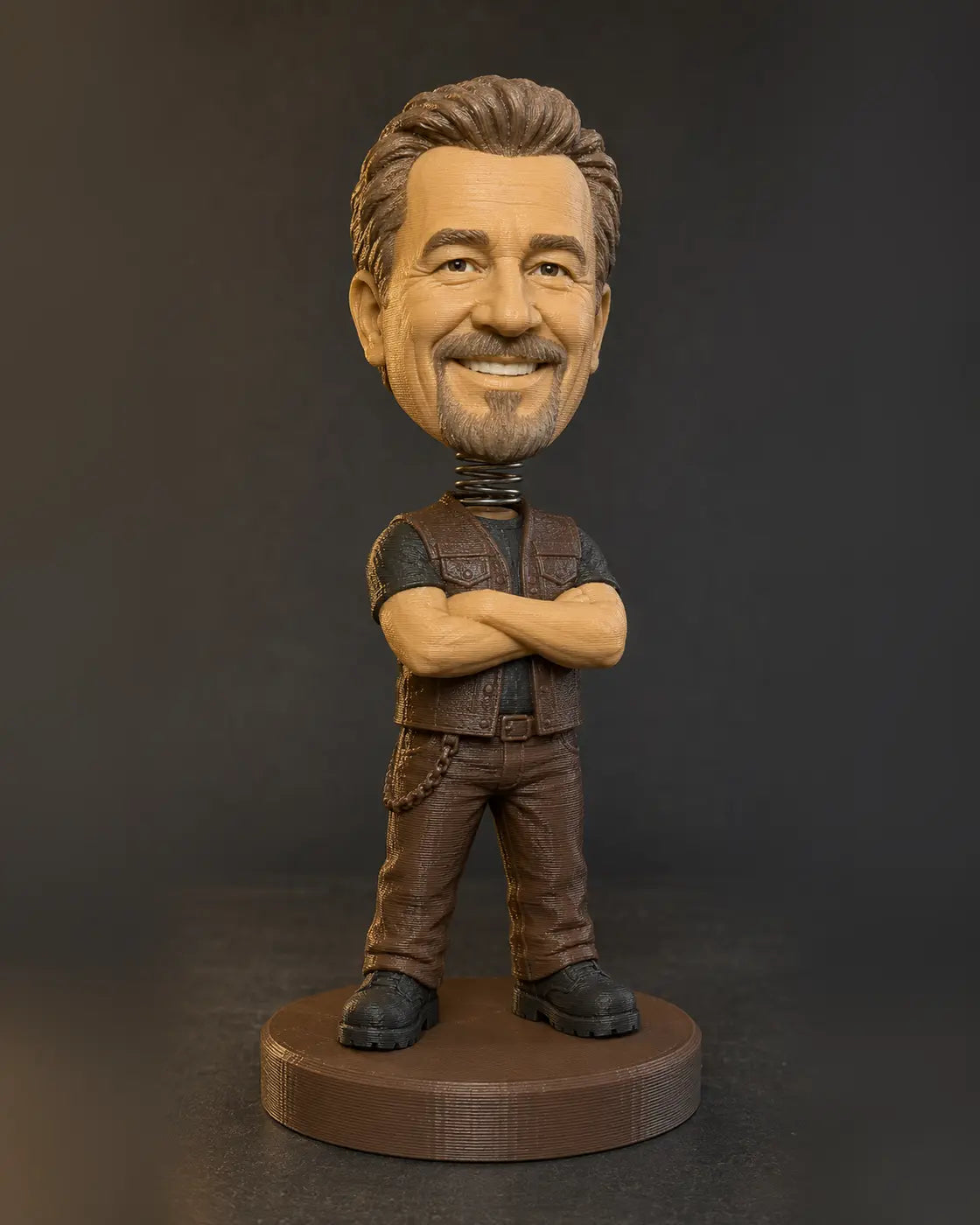 Earth-tone FDM printed bobblehead with visible spring